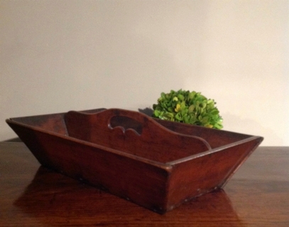 An Early 18th Century oak tray with a deep patina.