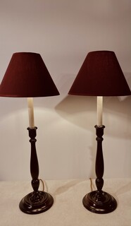 An English Antique Pair of Mahogany Table Lamps having Handmade Linnen Shades.