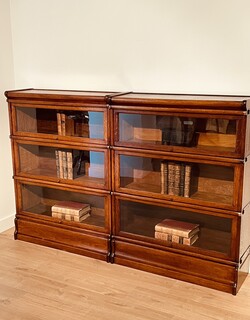 An English Pair of  Oak Globe Wernicke Bookcases. Each Three Sections Hight.