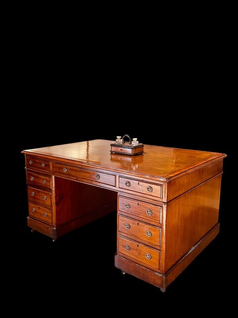 A Beautiful English 19th Century Mahogany Partners Desk with Original leather having a Stunning Patina.