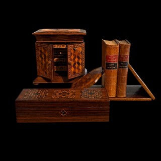 A collection of three fine 19th century English Tunbridge Ware pieces, comprising a cabinet, an extending bookcase and a glove box with exceptional mosaic marquetry.