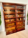 A pair of Antique Mahogany Globe Wernicke Bookcases. 