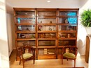 A Set of Three English Oak Globe Wernicke Bookcases. Six Sections High.