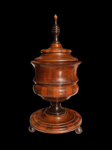 An 19th Century Mahogany Tobacco Jar on Stand.