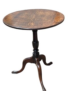 An English 18th Century Oak Tilt Top Table on a Tripod Base.