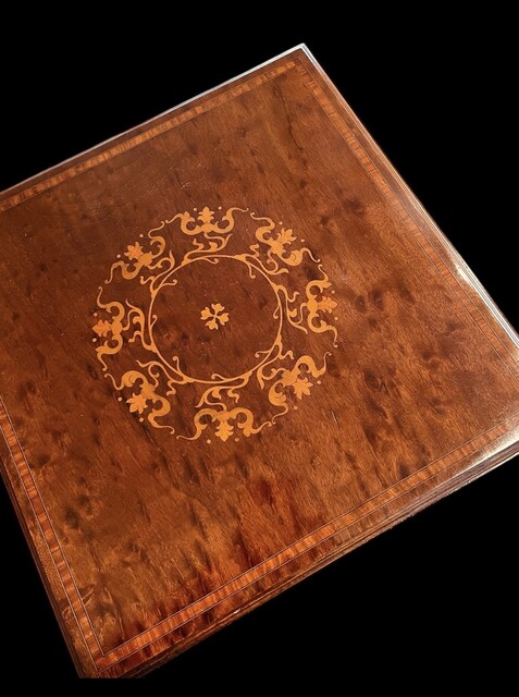 An English 19th Century Mahogany Revolving Bookcase having a very nice Satinwood Inlay.