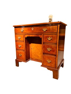 An English Antique Burr Walnut Kneehole Desk