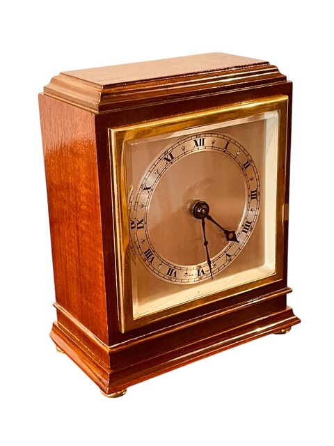 An English Art Deco Mahogany Elliott Clock.