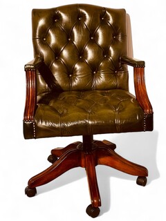 An English Chesterfield Desk / Office Chair adjustable in height having a beautiful Green Leather.