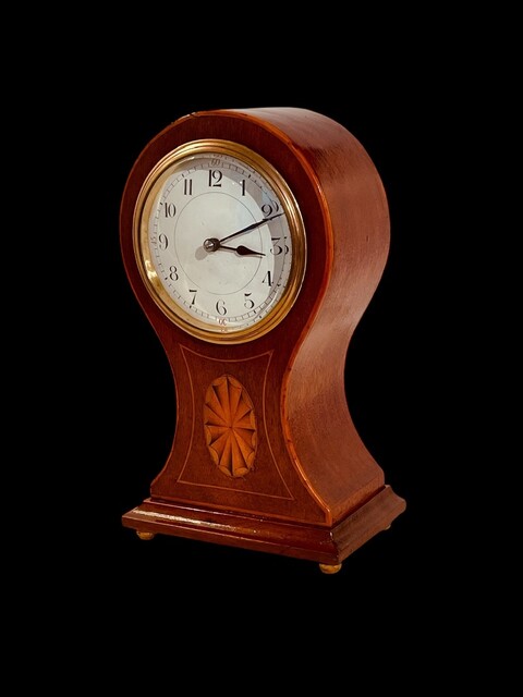 An English Edwardian Mahogany Balloon Mantel Clock having a Satinwood Inlay