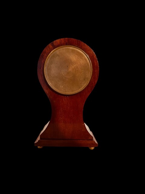 An English Edwardian Mahogany Balloon Mantel Clock having a Satinwood Inlay