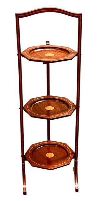 An English Edwardian Mahogany Folding Cakestand having a Satinwood Inlay