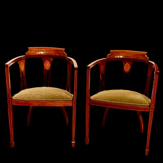 An English Pair of Edwardian Mahogany Tub Chairs.