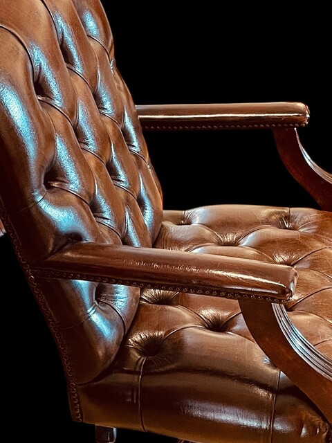 An English Swivel Chesterfield High Back Desk Chair adjustable in height 